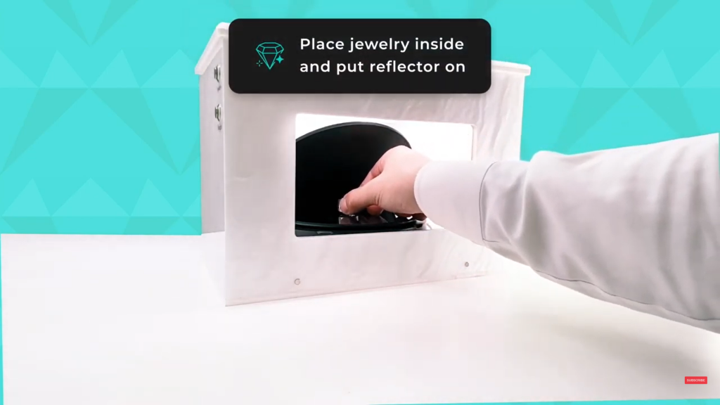 Place the jewelry inside the GemLightbox